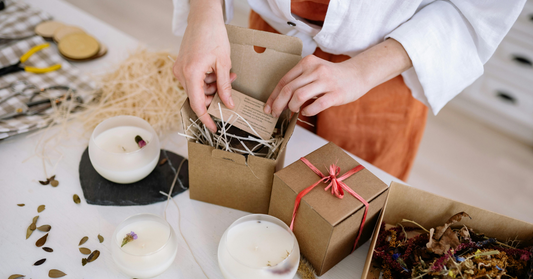 Handmade candles and eco-friendly packaging being prepared as Valentine's gift idea