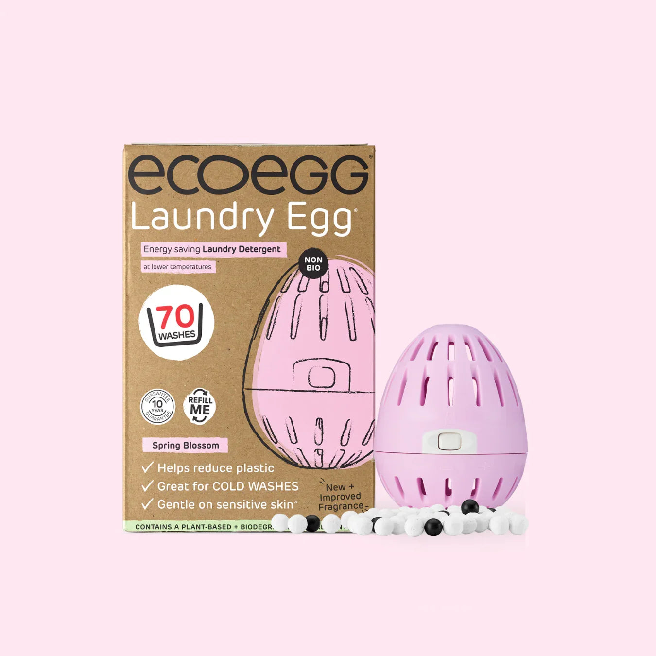 Pink ecoegg laundry detergent egg with packaging on a pink background