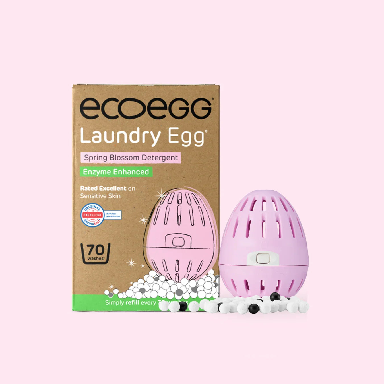 ecoegg laundry detergent egg with packaging on a pink background
